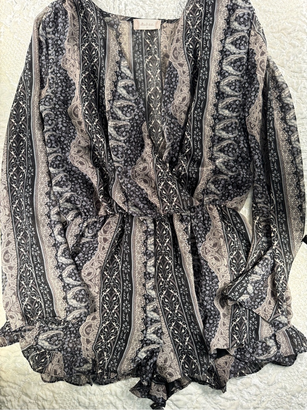 Altar'd State Black and Cream Patterned Wrap Romper